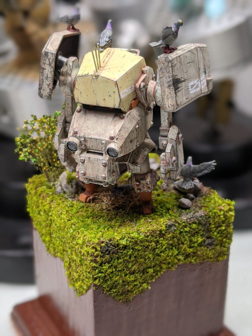 bird bush cavico_models diorama diorama_(medium) highres jgsdf_type_07_tank_nacchin looking_ahead matage_sanjuro mecha model_kit model_kit_(medium) no_humans open_hands photo_(medium) photoshop_(medium) pigeon red_eyes robot unconventional_media