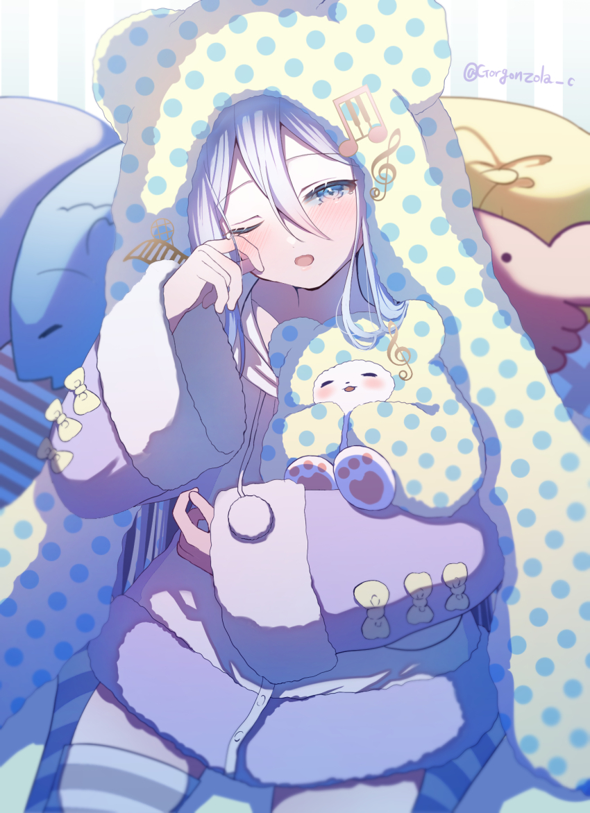 1girl animal_ears animal_hood blue_eyes blue_hair blush commentary fake_animal_ears fur_trim gorgonzola_c hair_between_eyes highres hood hoodie long_hair long_sleeves looking_at_viewer marumofubiyori musical_note one_eye_closed open_mouth project_sekai rubbing_eyes sanrio sitting sleepy solo striped_clothes striped_thighhighs stuffed_animal stuffed_toy thighhighs twitter_username very_long_hair yoisaki_kanade