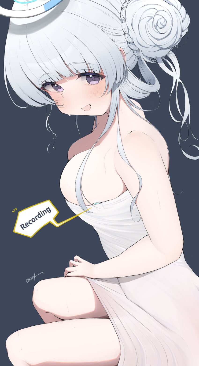 1girl artist_name blue_archive blunt_ends blush breasts bun_with_braided_base caff_(aosui9) cleavage commentary_request dress english_text feet_out_of_frame from_side grey_background grey_eyes grey_pupils hair_bun halo highres large_breasts long_hair long_sidelocks looking_at_viewer mechanical_halo microphone no_bra noa_(blue_archive) open_mouth shadow short_dress sidelocks simple_background sitting skindentation smile solo speech_bubble strapless strapless_dress taut_clothes taut_dress white_dress white_hair