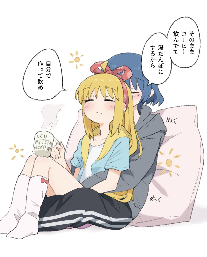 2girls black_pants blonde_hair blue_hair bocchi_the_rock! check_translation closed_eyes coffee_mug commentary_request cup hair_down hairband highres holding holding_cup hug ijichi_nijika long_hair look4_osagashi medium_hair mole mole_under_eye mug mug_writing multiple_girls no_shoes pants pillow pink_pillow red_hairband simple_background sitting sitting_on_person socks sweater translation_request white_background yamada_ryo yuri