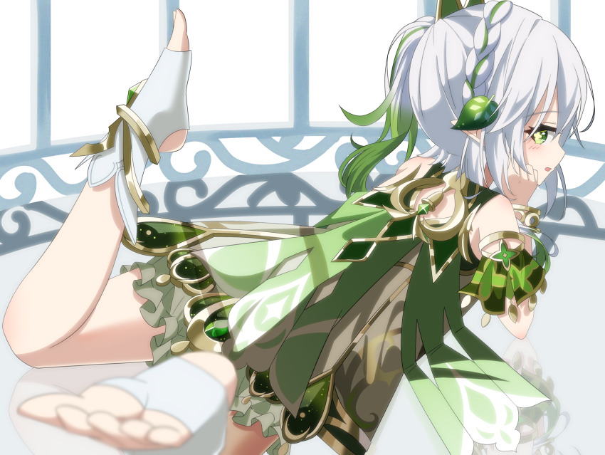 1girl bare_shoulders bloomers blush bracelet cape commentary_request cross-shaped_pupils detached_sleeves dress feet_up from_behind genshin_impact gold_trim gradient_hair green_cape green_eyes green_hair green_sleeves hair_between_eyes hair_ornament head_rest highres jewelry leaf_hair_ornament long_hair looking_at_viewer looking_back lying multicolored_hair nahida_(genshin_impact) on_stomach parted_lips pointy_ears reflection sankaku_(maruchann32) side_ponytail sleeveless sleeveless_dress solo stirrup_legwear symbol-shaped_pupils toeless_legwear toes underwear white_bloomers white_dress white_hair