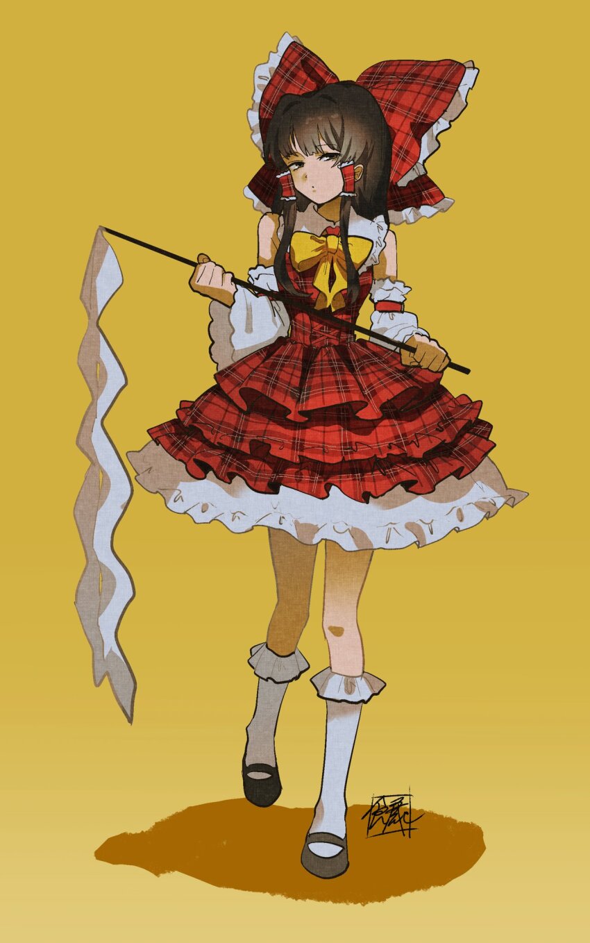 1girl adapted_costume bow brown_hair dress gohei hair_bow hakurei_reimu highres holding holding_gohei lolita_fashion plaid_clothes plaid_dress red_bow red_dress sokura_(mochichitose) solo sweet_lolita touhou yellow_background