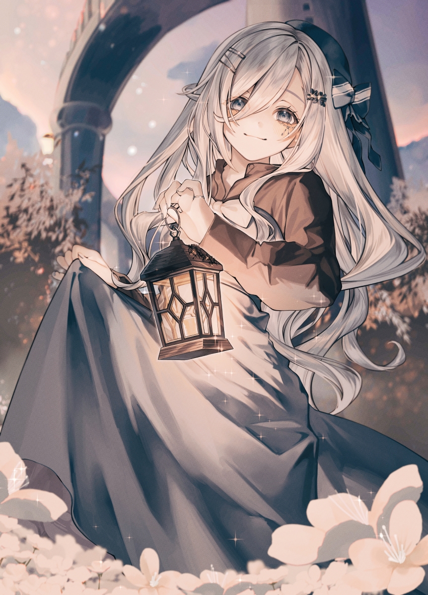 1girl absurdres black_hat black_shirt blurry blurry_background blush bow closed_mouth clothes_lift commentary_request field fingernails flower flower_field grey_bow grey_eyes grey_nails grey_skirt hair_between_eyes hair_ornament hairclip hat highres holding holding_lantern jewelry lantern long_hair long_skirt long_sleeves looking_at_viewer nail_polish ohuton_inu original outdoors parted_bangs ring shirt skirt skirt_lift sleeves_past_wrists smile solo sparkle standing very_long_hair wavy_hair white_flower