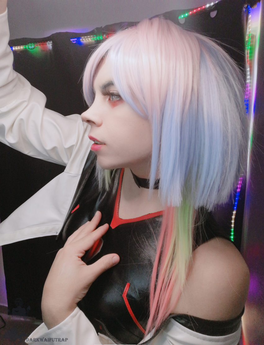 1boy absurdres androgynous arm_support bare_shoulders black_leotard cosplay cowboy_shot cyberpunk_(series) cyberpunk_edgerunners darkwaifutrap earrings hair_ribbon hand_on_own_chest heattech_leotard highleg highleg_leotard highres jacket jewelry leotard lipstick long_hair long_sleeves lucy_(cyberpunk) lucy_(cyberpunk)_(cosplay) makeup off-shoulder_jacket off_shoulder open_clothes open_jacket parted_bangs photo_(medium) purple_hair real_life ribbon short_shorts shorts skindentation sleeveless_turtleneck_leotard smile solo trap turtleneck very_long_hair watermark white_hair white_jacket