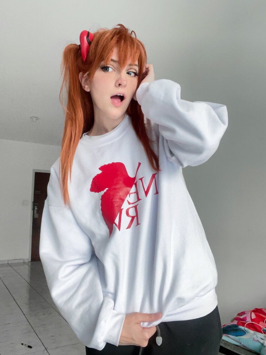 1girl blue_eyes brazilian_(nationality) brown_hair cosplay freckles highres interface_headset_(evangelion) memepantazis neon_genesis_evangelion open_mouth photo_(medium) souryuu_asuka_langley souryuu_asuka_langley_(cosplay) sweater twintails two_side_up