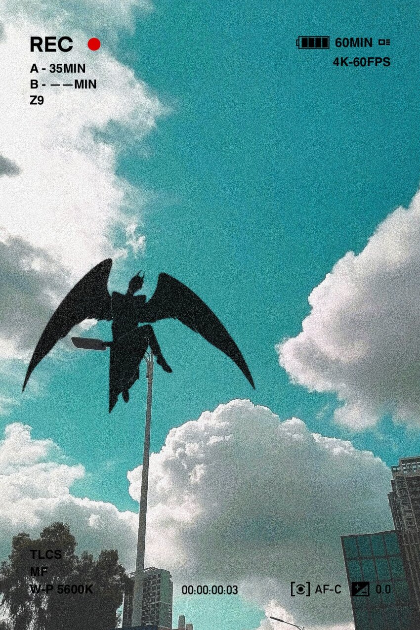 1boy adversarial_noise benkdjjituibot black_coat black_wings blue_sky building cloud cloudy_sky coat crossed_legs day demon_horns fake_photograph feathered_wings from_below head_tilt highres horns kim_dokja lamppost male_focus official_alternate_costume omniscient_reader&#039;s_viewpoint recording silhouette sitting sitting_on_object sky skyscraper solo tree wings