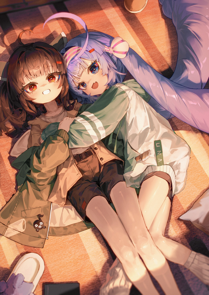 2girls :d absurdres ahoge ap04astral belt black_belt black_shorts blue_eyes blunt_bangs blush brown_hair commentary_request dated_commentary feet_out_of_frame green_jacket grin hair_ornament hairclip headgear highres hug jacket long_hair long_sleeves looking_at_viewer lying multiple_girls on_back on_side open_clothes open_jacket open_mouth otomachi_una purple_hair red_eyes ribbed_socks shirt short_hair shorts slippers smile socks teeth touhoku_kiritan twintails unworn_slippers voiceroid white_shirt white_slippers white_socks