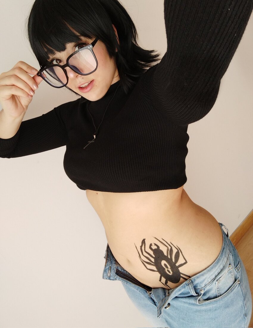1girl black-framed_eyewear black_hair black_sweater cosplay cosplay_photo cross cross_necklace female_focus glasses highres hunter_x_hunter indoors jewelry looking_at_viewer maitwerking midriff necklace parted_lips photo_(medium) real_life shizuku_murasaki shizuku_murasaki_(cosplay) solo spanish_(nationality) spider_tattoo stomach_tattoo sweater tattoo teeth turtleneck turtleneck_sweater