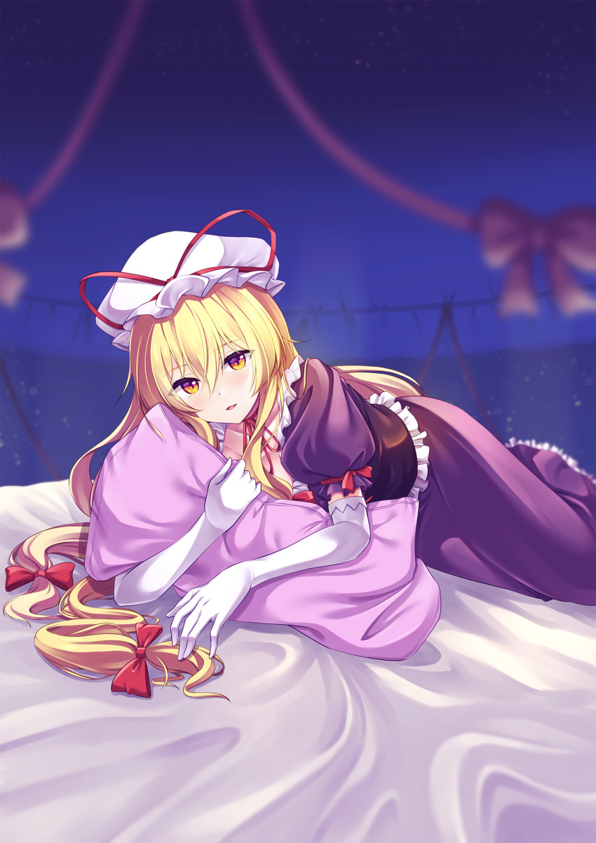 1girl bed blonde_hair bow choker corset dress elbow_gloves frilled_corset frilled_dress frills gloves hair_bow hat hat_ribbon highres hugging_object long_dress looking_at_viewer lying mob_cap multiple_hair_bows murasaki_atsushi on_stomach parted_lips pillow puffy_short_sleeves puffy_sleeves purple_corset purple_dress red_bow red_ribbon ribbon ribbon_choker short_sleeves touhou white_gloves white_hat yakumo_yukari yellow_eyes