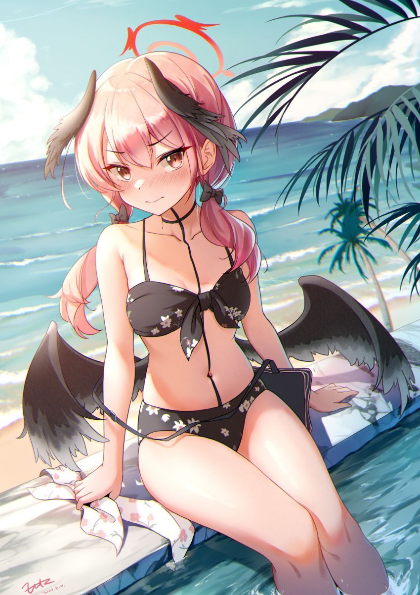 1girl absurdres beach bikini black_bag black_bikini black_bow black_wings blue_archive blue_sky blurry blush bow breasts closed_mouth cloud collarbone commentary depth_of_field embarrassed feathered_wings floral_print fritz614 hair_bow halo head_wings highres koharu_(blue_archive) koharu_(swimsuit)_(blue_archive) looking_at_viewer low_twintails low_wings navel ocean official_alternate_costume outdoors palm_tree pink_eyes pink_hair print_bikini red_halo unworn_ribbon signature sitting sky small_breasts soaking_feet solo swimsuit tattoo tree twintails wings