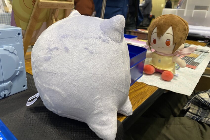 brown_hair digimon kuramon looking_at_another photo_(medium) real_life scarf stuffed_toy yagami_hikari