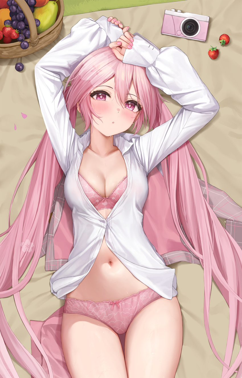 1girl absurdres arms_up blush bow bow_panties bra breasts cleavage cowboy_shot digital_camera food fruit fruit_basket hair_between_eyes hatsune_miku highres jacket keine09 long_sleeves looking_at_viewer lying medium_breasts navel on_back panties partially_unbuttoned pink_bra pink_eyes pink_panties sakura_miku shirt solo strawberry twintails underwear unworn_jacket vocaloid white_shirt
