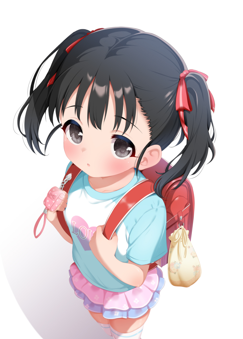 1girl :o backpack bag black_eyes black_hair blue_shirt blue_skirt child clothes_writing commentary_request crime_prevention_buzzer fukuyama_mai hair_ribbon heart heart_print highres holding_strap hosizora_mikoto idolmaster idolmaster_cinderella_girls looking_at_viewer medium_hair open_mouth pink_skirt print_shirt randoseru red_bag red_ribbon ribbon shirt short_sleeves skirt solo t-shirt thighhighs twintails two-tone_skirt white_background white_thighhighs
