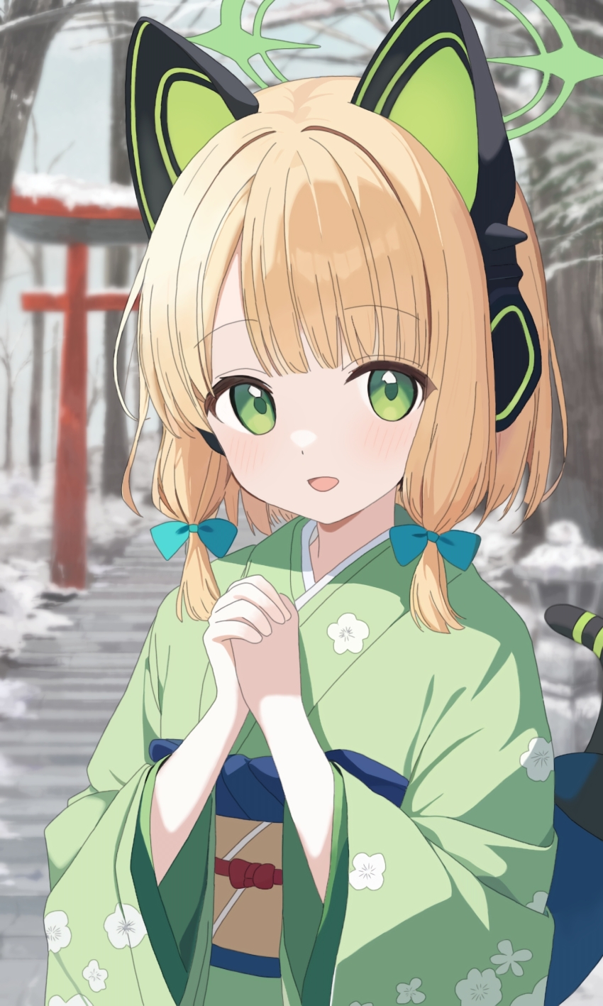 1girl :d absurdres alternate_costume animal_ear_headphones animal_ears blonde_hair blue_archive blue_bow blunt_bangs blurry blurry_background blush bow cat_ear_headphones cat_tail cherry_blossom_print commentary day fake_animal_ears fake_tail floral_print floral_print_kimono green_eyes green_halo green_kimono hair_bow halo happy hatsumoude headphones highres interlocked_fingers japanese_clothes kimono knight1208 long_sleeves looking_at_viewer midori_(blue_archive) new_year open_mouth outdoors own_hands_together print_kimono short_hair sidelighting sidelocks smile snow solo tail tareme torii wide_sleeves winter
