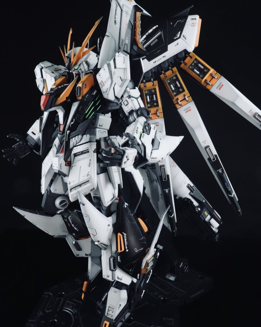 char&#039;s_counterattack fin_funnels fusion green_eyes gundam gundam_hathaway&#039;s_flash gunpla haru_(shun_yakaraj) highres looking_down mecha mobile_suit model_kit model_kit_(medium) no_humans nu_gundam open_hands photo_(medium) robot science_fiction solo unconventional_media v-fin xi_gundam