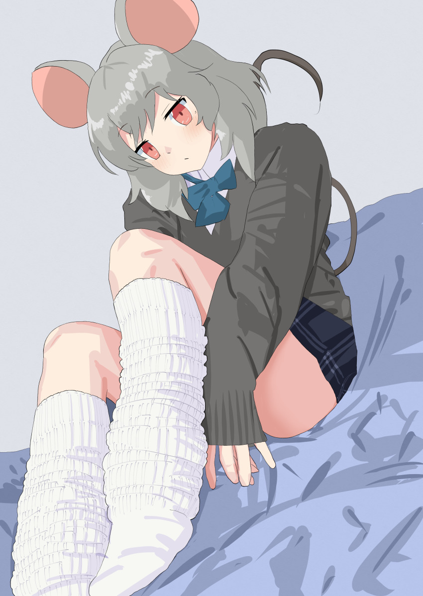 1girl absurdres alternate_costume animal_ears bed_sheet black_skirt blush commentary_request contemporary doubutsu_koujou grey_hair grey_sweater highres knees_up looking_at_viewer loose_socks mouse_ears mouse_tail nazrin red_eyes school_uniform shirt sitting skirt socks solo sweater tail touhou white_shirt white_socks