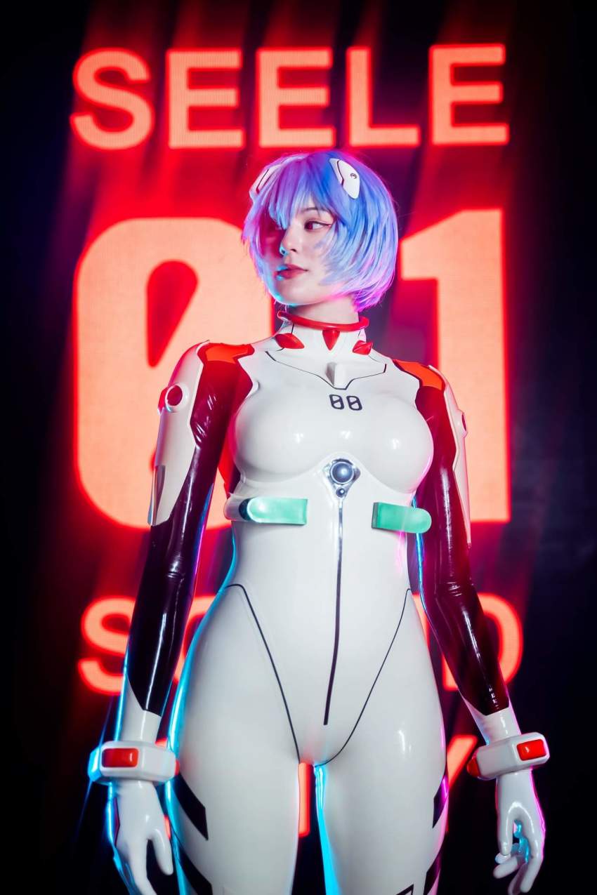 1girl ayanami_rei ayanami_rei_(cosplay) blue_hair cosplay female_focus highres mecha_pilot_suit neon_genesis_evangelion photo_(medium) plugsuit_(cosplay) plugsuit_(evangelion) seele_(evangelion) tagme