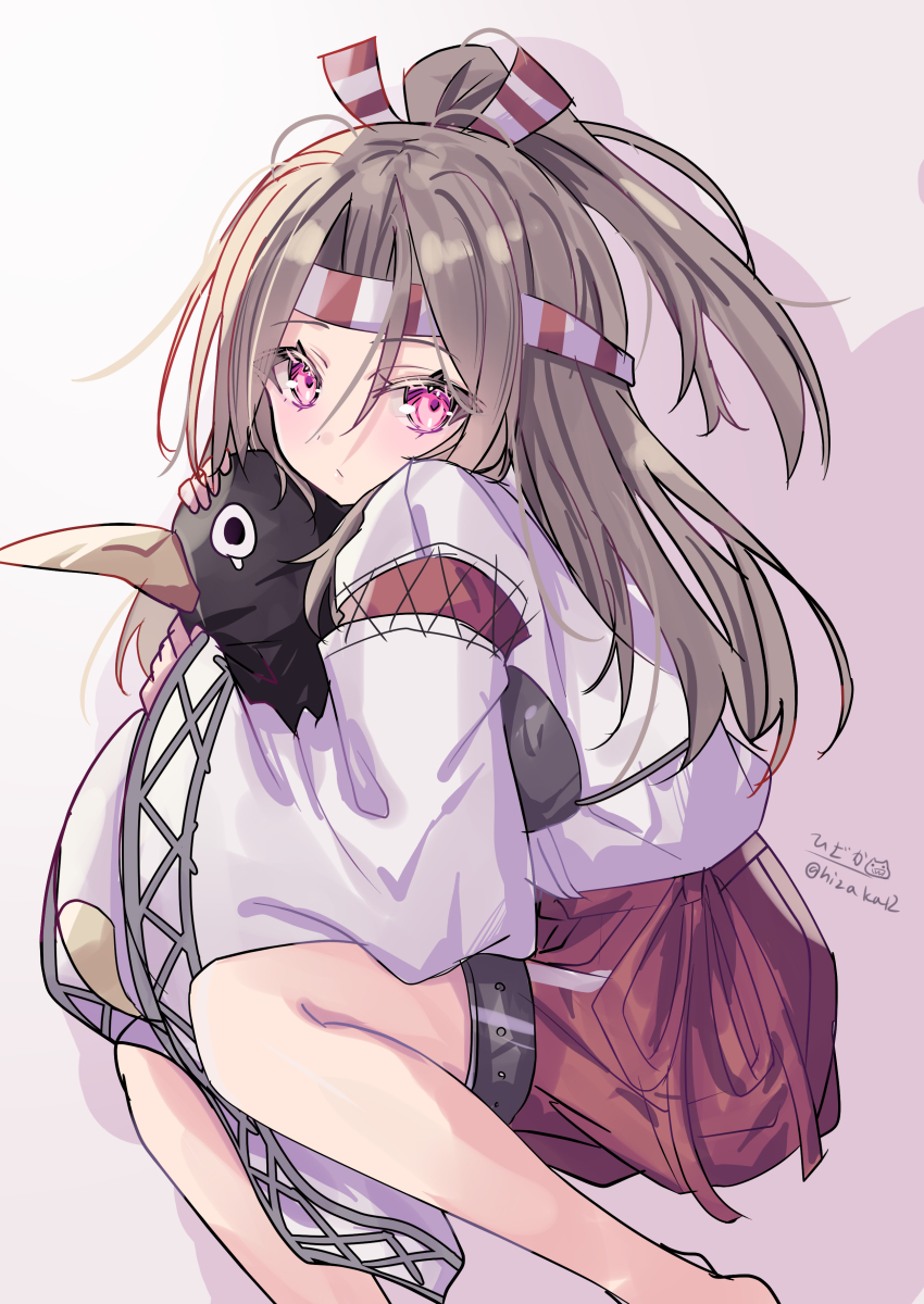 1girl absurdres brown_hair failure_penguin feet_out_of_frame hachimaki hakama hakama_shorts headband high_ponytail highres hizaka hugging_doll hugging_object japanese_clothes kantai_collection muneate one-hour_drawing_challenge ponytail red_eyes red_shorts shorts sitting solo striped_headband zuihou_(kancolle)