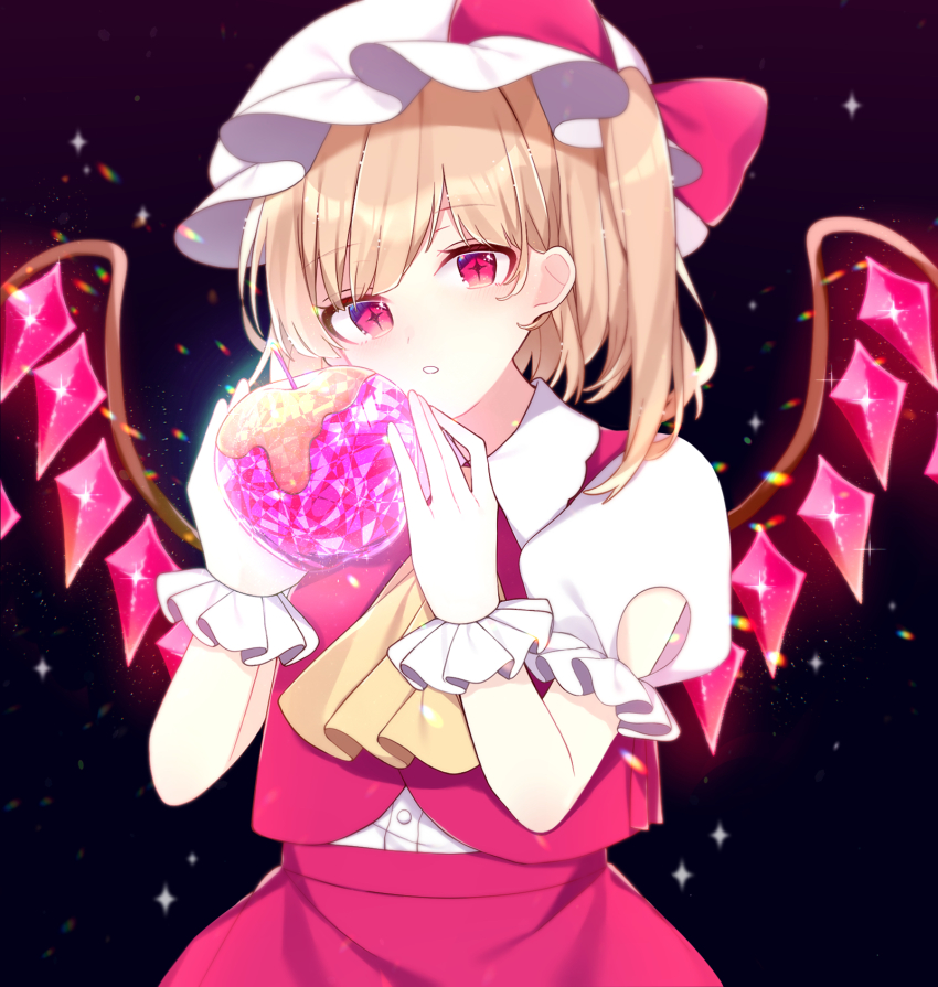 +_+ 1girl apple ascot black_background blonde_hair blush bow collared_shirt commentary crystal crystal_apple flandre_scarlet food frilled_sleeves frills fruit glowing hands_up hat hat_bow head_tilt highres holding holding_food holding_fruit looking_at_viewer mob_cap one_side_up parted_lips puffy_short_sleeves puffy_sleeves red_bow red_eyes red_skirt red_vest shirt short_hair short_sleeves simple_background skirt solo symbol-only_commentary symbol-shaped_pupils touhou upper_body vest white_hat white_shirt wings wrist_cuffs yellow_ascot yurui_tuhu