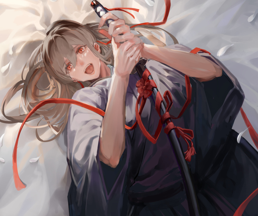 1girl :d brown_hair commentary_request hair_between_eyes hakama hands_up holding holding_sword holding_weapon ingenkita japanese_clothes katana long_hair looking_at_viewer lying on_back on_bed open_mouth original red_eyes red_ribbon ribbon sheath sheathed smile solo sword teeth tongue upper_body upper_teeth_only weapon white_petals