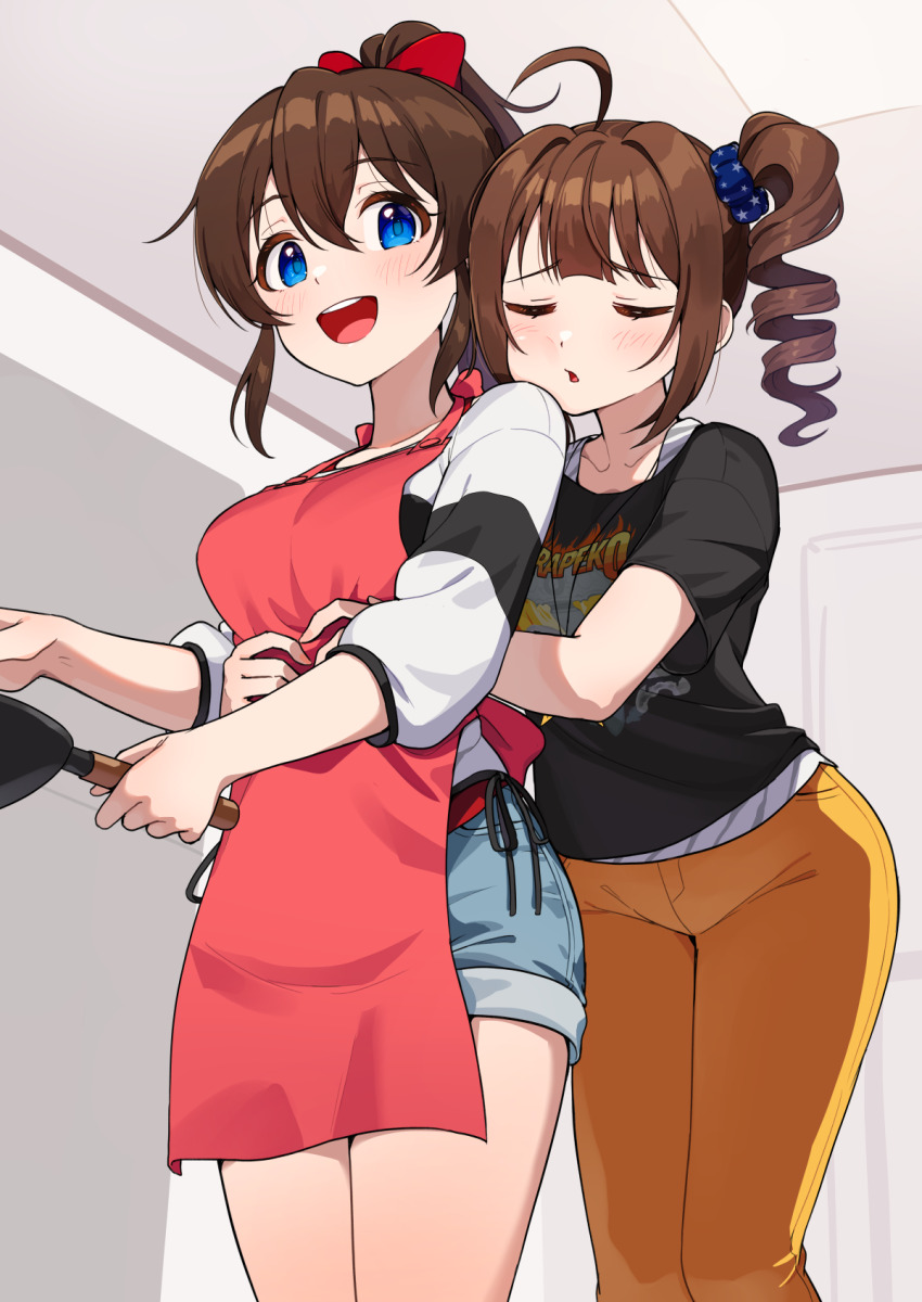 2girls :d apron black_shirt blue_eyes blush breasts brown_hair closed_eyes highres hug idolmaster idolmaster_million_live! idolmaster_million_live!_theater_days kamille_(vcx68) medium_breasts multiple_girls open_mouth orange_pants pants pink_apron ponytail satake_minako shirt shorts side_ponytail smile sweater t-shirt teeth upper_teeth_only yokoyama_nao