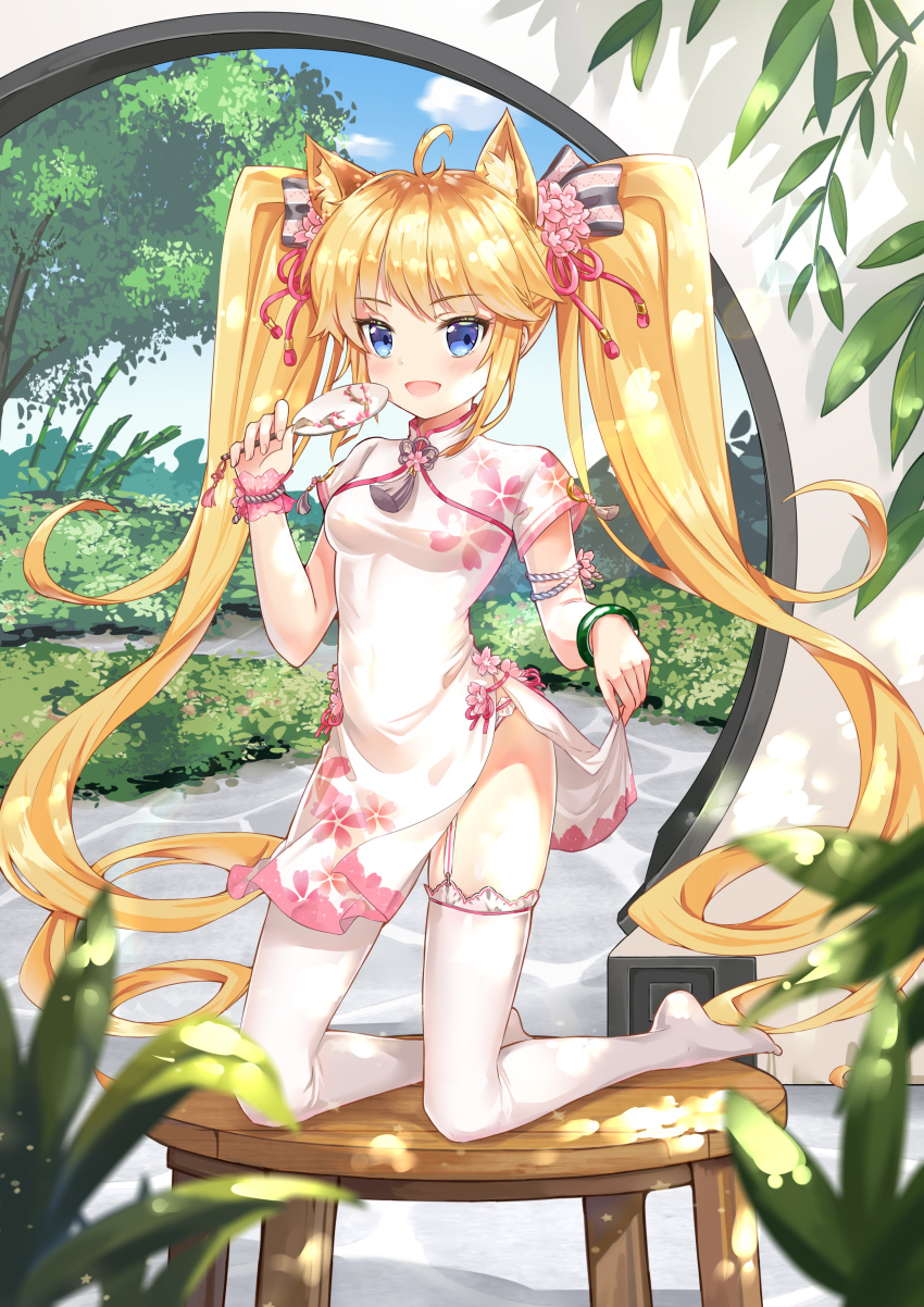 1girl absurdres andrea_doria_(warship_girls_r) animal_ears bamboo blonde_hair blue_eyes breasts cat_ears china_dress chinese_clothes dress female_focus full_body hair_ornament hand_fan highres kneeling long_hair looking_at_viewer no_shoes plant skirt_hold small_breasts solo table thighhighs tree tucaoxingren_youyou twintails warship_girls_r