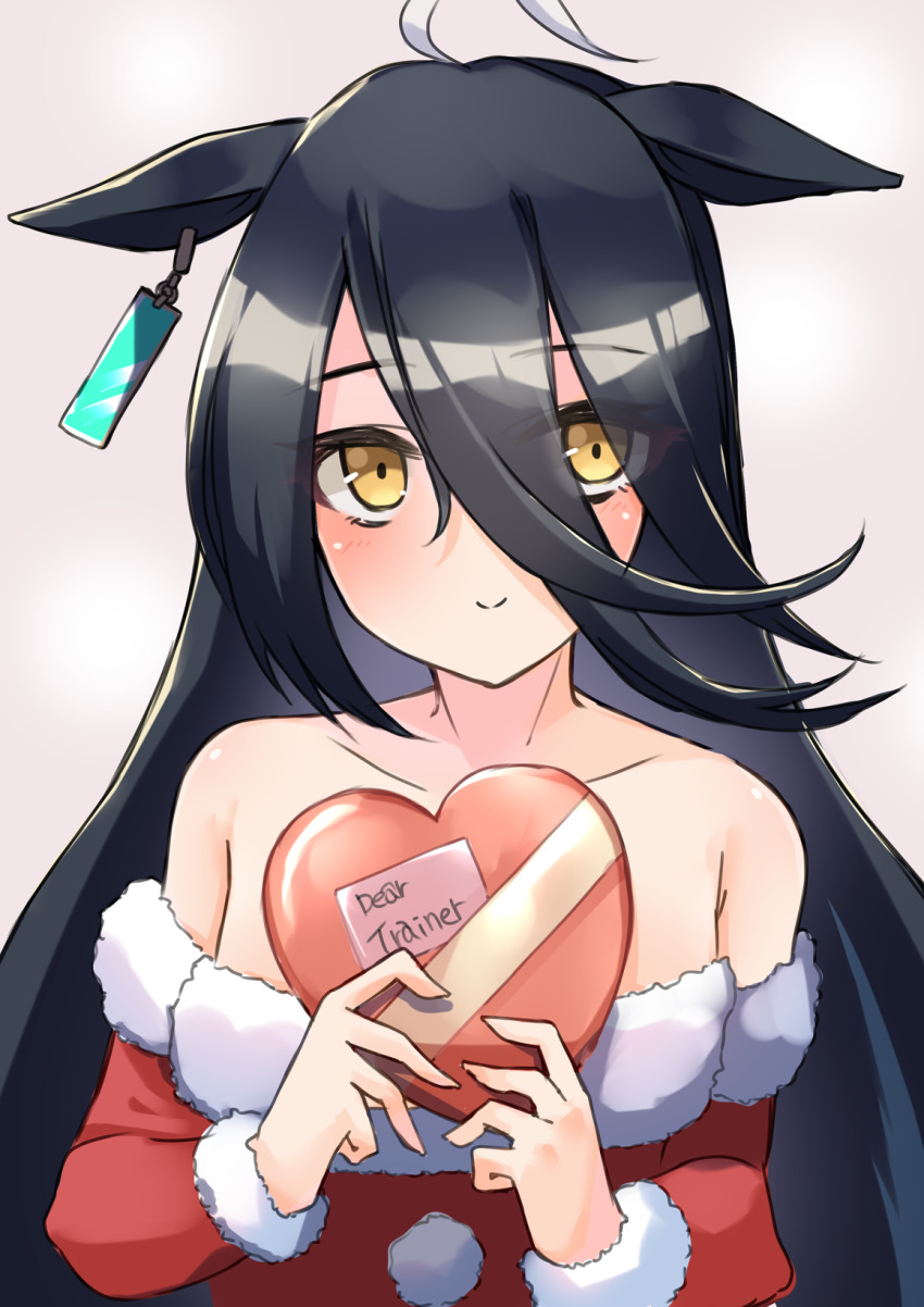 1girl ahoge animal_ears black_hair blush box collarbone earrings eyes_visible_through_hair gift gift_box hair_between_eyes heart-shaped_box highres holding holding_gift horse_ears horse_girl jewelry komb long_hair long_sleeves looking_at_viewer manhattan_cafe_(umamusume) pom_pom_(clothes) santa_costume single_earring smile solo umamusume upper_body white_hair yellow_eyes