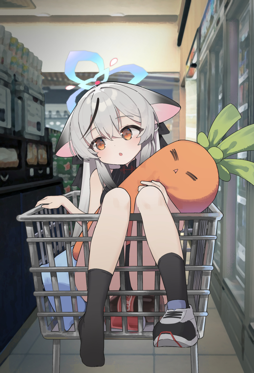 1girl :o absurdres animal_ears biluoyao black_hair black_socks blue_archive blue_halo chinese_clothes dress facing_viewer grey_hair halo head_tilt highres kokona_(blue_archive) long_hair multicolored_hair orange_eyes shoes shop shopping_cart sideways_glance single_shoe sitting socks solo streaked_hair stuffed_carrot tiger_ears very_long_hair