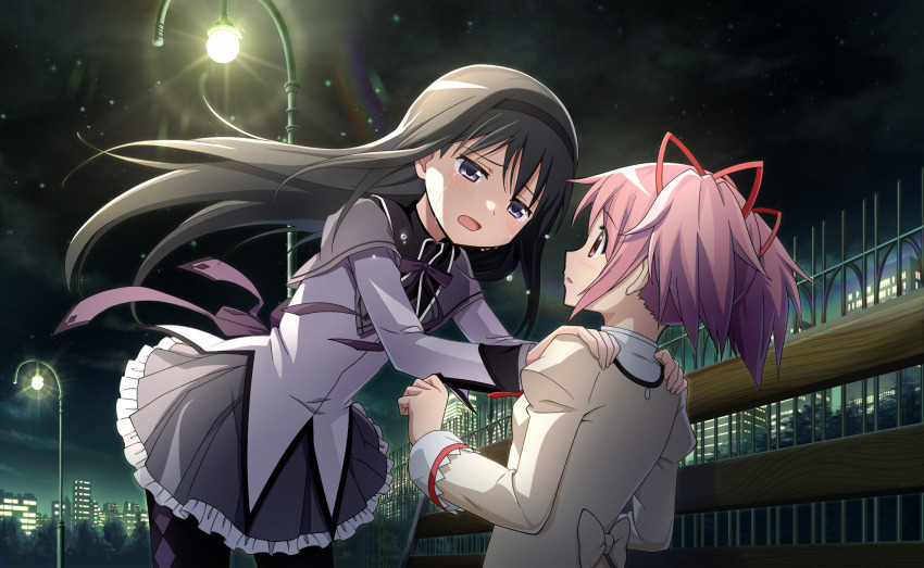 2girls akemi_homura akemi_homura_(magical_girl) back_bow black_hair black_hairband black_sky blue_eyes bow capelet city company_name copyright_name cowboy_shot crying crying_with_eyes_open eye_contact fence game_cg grey_capelet grey_skirt hair_ribbon hairband hands_on_another&#039;s_shoulders highres juliet_sleeves kaname_madoka lamppost leaning_forward long_hair long_sleeves looking_at_another mahou_shoujo_madoka_magica mahou_shoujo_madoka_magica_magia_exedra mitakihara_school_uniform multiple_girls neck_ribbon night night_sky official_art open_mouth outdoors pantyhose pink_hair puffy_sleeves ribbon school_uniform short_hair short_twintails skirt sky standing tears twintails
