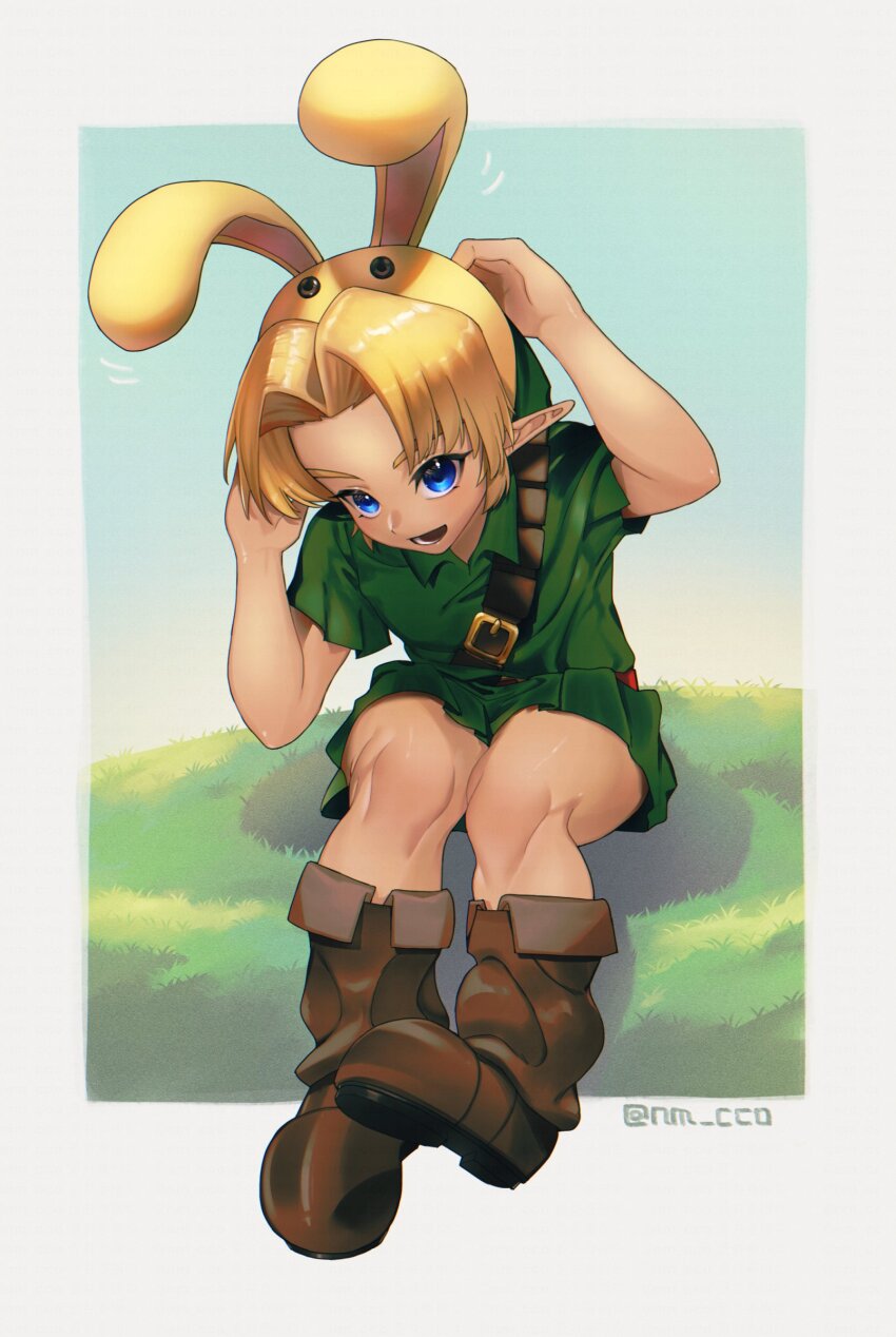 1boy animal_ears ao_haruki belt belt_buckle blonde_hair blue_eyes boots border brown_belt brown_boots buckle bunny_hood_(zelda) child commentary_request full_body green_hat green_tunic hands_on_own_head hat highres link looking_at_viewer nintendo on_grass open_mouth outside_border pointy_ears rabbit_ears shoulder_belt sitting smile solo the_legend_of_zelda the_legend_of_zelda:_ocarina_of_time tunic twitter_username white_border young_link