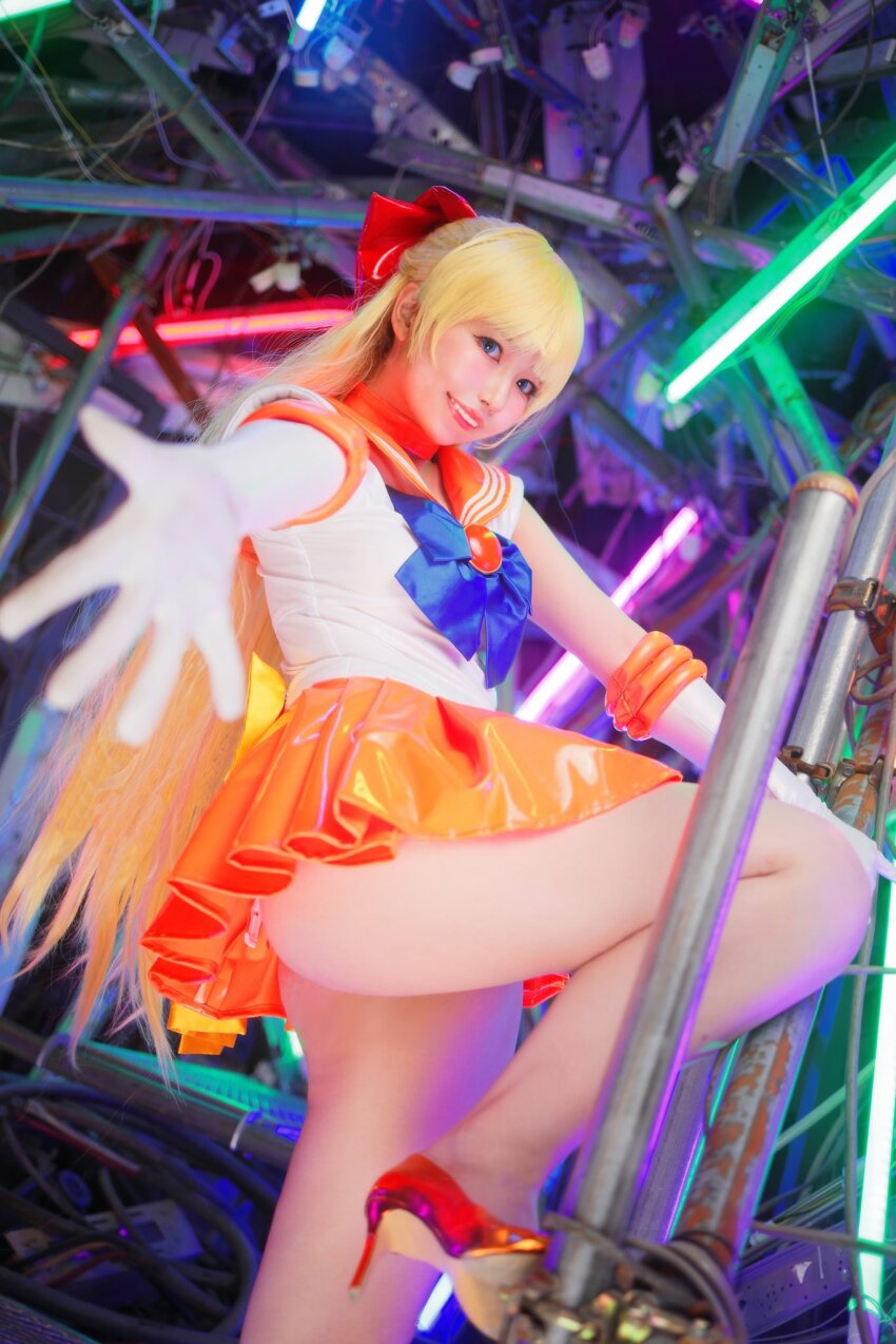 1boy 1girl aino_minako ass bishoujo_senshi_sailor_moon blonde_hair blue_eyes bow cosplay cosplay_photo extended_arm gloves high_heels highres looking_at_viewer madokacos miniskirt photo_(medium) real_life red_bow sailor_venus sailor_venus_(cosplay) skirt