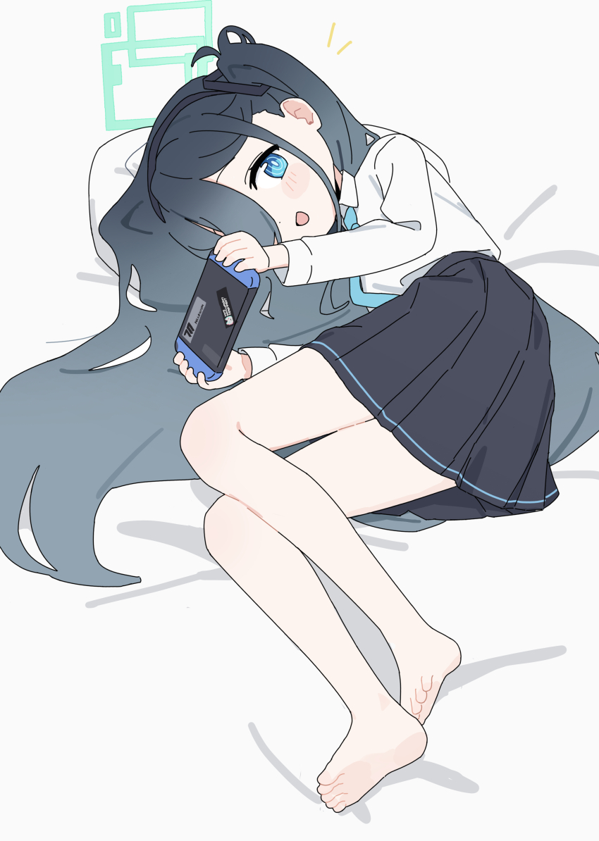 1girl absurdres ame_miya_ta aqua_halo aqua_necktie aris_(blue_archive) barefoot bed_sheet black_hairband black_skirt blue_archive blue_eyes grey_hair hair_over_one_eye hairband halo handheld_game_console highres holding holding_handheld_game_console light_blush long_hair long_sleeves looking_at_viewer lying miniskirt necktie nintendo_switch notice_lines on_bed on_side open_mouth school_uniform shirt skirt smile soles solo toes white_shirt
