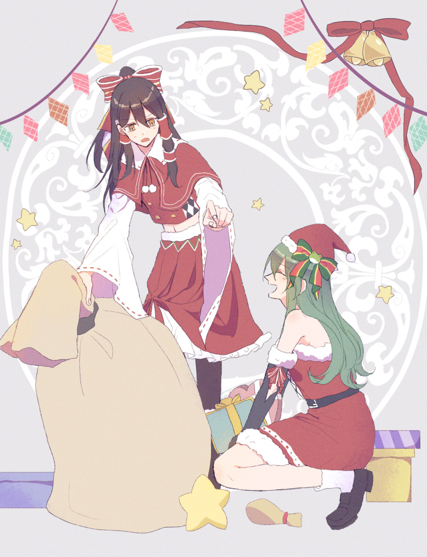 2girls alternate_costume bare_shoulders belt black_belt black_shoes bow brown_eyes capelet christmas christmas_lights dot_nose frog_hair_ornament gift green_bow green_hair hair_bow hair_ornament hakurei_reimu happy hat highres holding holding_sack kochiya_sanae long_hair long_sleeves midriff multiple_girls navel open_mouth red_bow red_capelet sack santa_costume santa_hat shoes single_sidelock skirt skirt_set touhou wide_sleeves yuuki8684