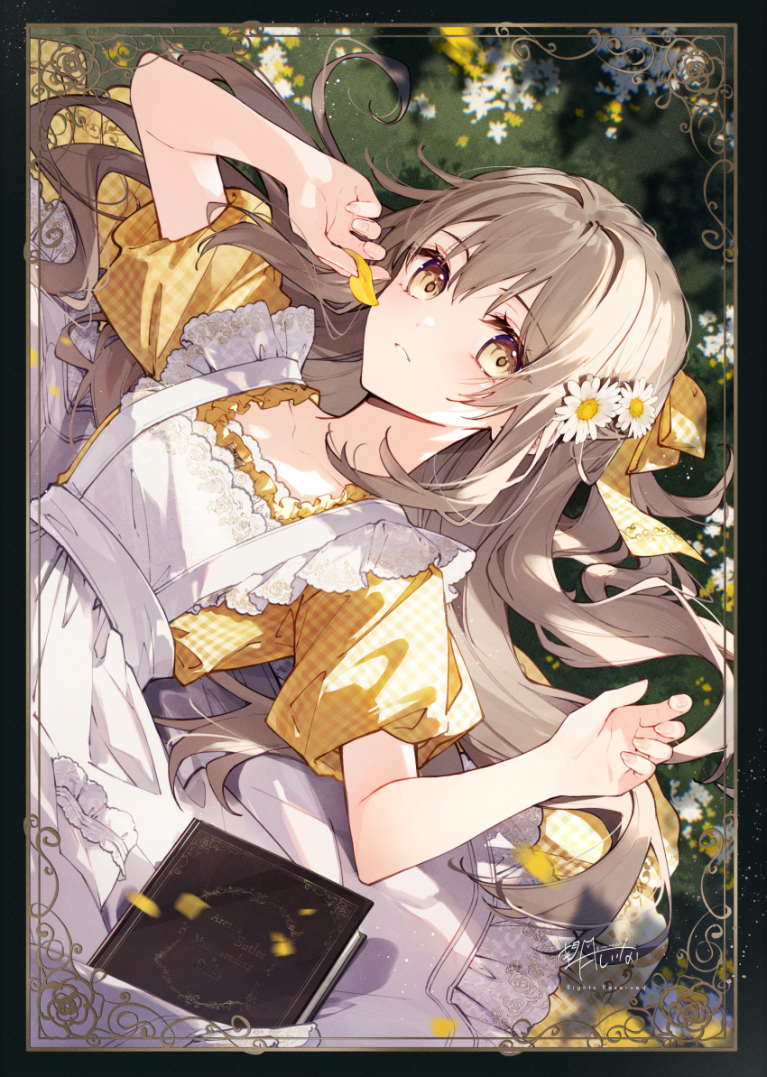 1girl annelise_(mochizuki_shiina) apron black_border blush book border breasts brown_dress brown_hair collarbone commentary_request daisy dappled_sunlight dress flower from_above hair_flower hair_ornament highres karisome_no_shitsuji_to_koushaku_no_himegoto light_particles long_hair looking_at_viewer lying mochizuki_shiina on_back on_grass on_ground outdoors parted_lips plaid_clothes plaid_dress shirt small_breasts smile solo sunlight upper_body white_apron yellow_eyes