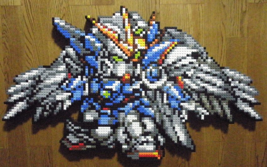 armor chibi full_body green_eyes gundam gundam_wing gundam_wing:_endless_waltz highres lego lego_(medium) looking_to_the_side mecha mobile_suit photo_(medium) pixel_art robot solo standing unconventional_media v-fin wing_gundam_zero_custom you_rei_(blowback)