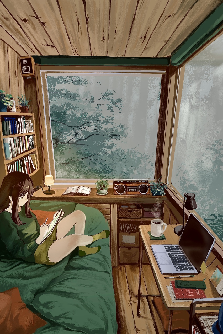 1girl absurdres book brown_hair cabinet commentary computer crossed_legs cup flower flower_pot green_blanket green_shirt green_shorts green_socks highres holding holding_tablet_pc indoors lamp laptop meanstreet mug on_bed original pillow shirt shorts sitting socks solo table tablet_pc window wooden_ceiling wooden_floor wooden_wall