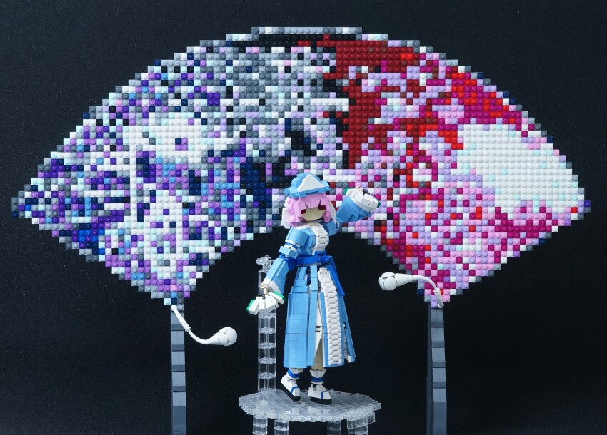 1girl absurdres blue_dress breasts dress hand_fan highres holding holding_fan lego_(medium) looking_ahead medium_breasts mike_vd photo_(medium) pink_hair red_eyes saigyouji_yuyuko saigyouji_yuyuko&#039;s_fan_design short_hair standing touhou unconventional_media white_footwear