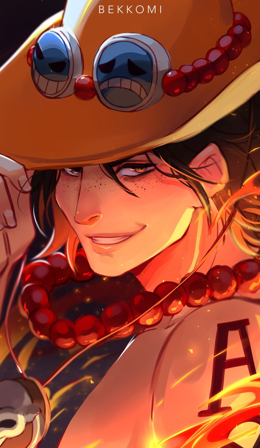 1boy absurdres arm_tattoo artist_name bead_necklace beads bekkomi black_hair commentary cowboy_hat english_commentary fire freckles hat highres jewelry looking_at_viewer male_focus necklace one_piece orange_hat portgas_d._ace short_hair skull smile solo tattoo teeth topless_male