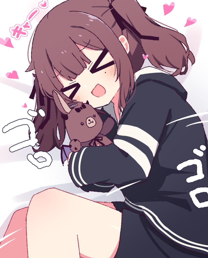&gt;_&lt; 1girl :d black_hoodie black_shorts blush brown_hair cevio commentary dated_commentary heart hibino_000 highres hood hood_down hoodie hugging_object long_sleeves lying mole mole_under_eye natsuki_karin on_side open_mouth short_hair shorts smile solo stuffed_toy two_side_up xd