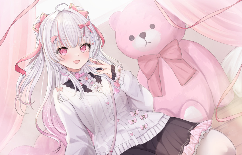 1girl :d ahoge aikami_lise black_shirt black_skirt bow buttons cardigan commentary_request commission dolphin_hair_ornament double_bun earrings fang frilled_skirt frills gradient_hair hair_bow hair_bun hair_ornament heart heart-shaped_pillow heart_button heart_earrings heart_hair_ornament indie_virtual_youtuber indoors jewelry kurage_cc large_teddy_bear long_hair long_sleeves looking_at_viewer multicolored_hair open_mouth pillow pink_bow pink_eyes pink_hair playing_with_own_hair seiza shirt sitting skeb_commission skin_fang skirt smile solo streaked_hair stuffed_animal stuffed_toy sunlight teddy_bear two_side_up virtual_youtuber white_cardigan white_hair window