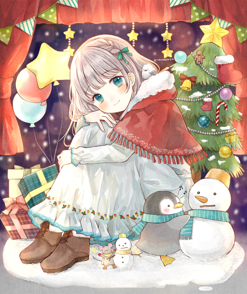 1girl aqua_eyes bell bird blue_scarf blush boots box braid brown_boots brown_hair capelet christmas_tree commentary_request gift gift_box highres hood hood_down hooded_capelet hugging_own_legs looking_at_viewer mouse_(animal) original penguin red_capelet santa_boots scarf sitting snowman solo star_(symbol) string_of_flags tententuyu twitter_username