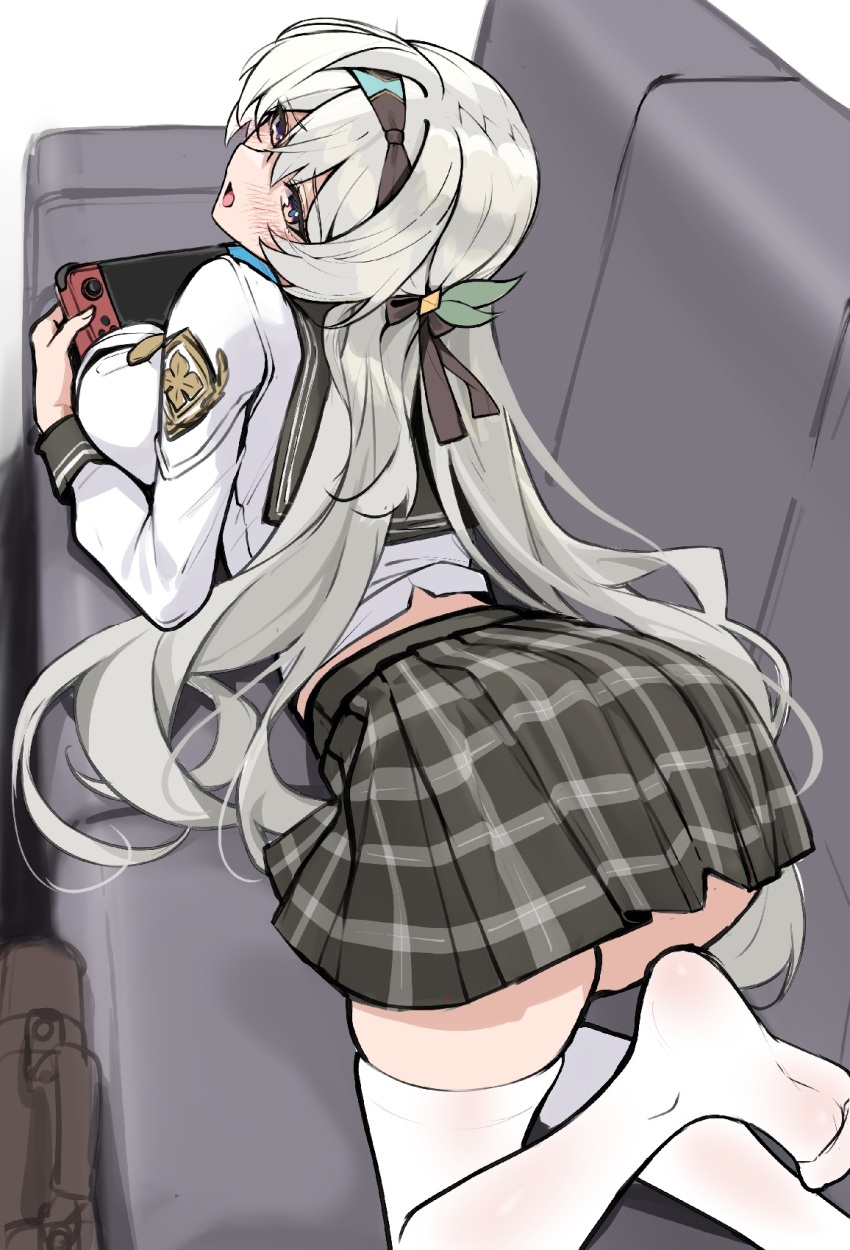 1girl bag blue_pupils blush breasts brown_bag brown_hairband brown_ribbon couch firefly_(honkai:_star_rail) firefly_(spring_missive)_(honkai:_star_rail) from_behind gradient_eyes grey_hair grey_sailor_collar grey_skirt hair_between_eyes hair_intakes hair_ornament hair_ribbon hairband handbag highres honkai:_star_rail honkai_(series) large_breasts long_sleeves lying matrix16 multicolored_eyes nintendo_switch on_couch on_stomach open_mouth pleated_skirt ribbon sailor_collar see-through_clothes see-through_legwear skirt smile solo thighhighs white_sleeves white_thighhighs