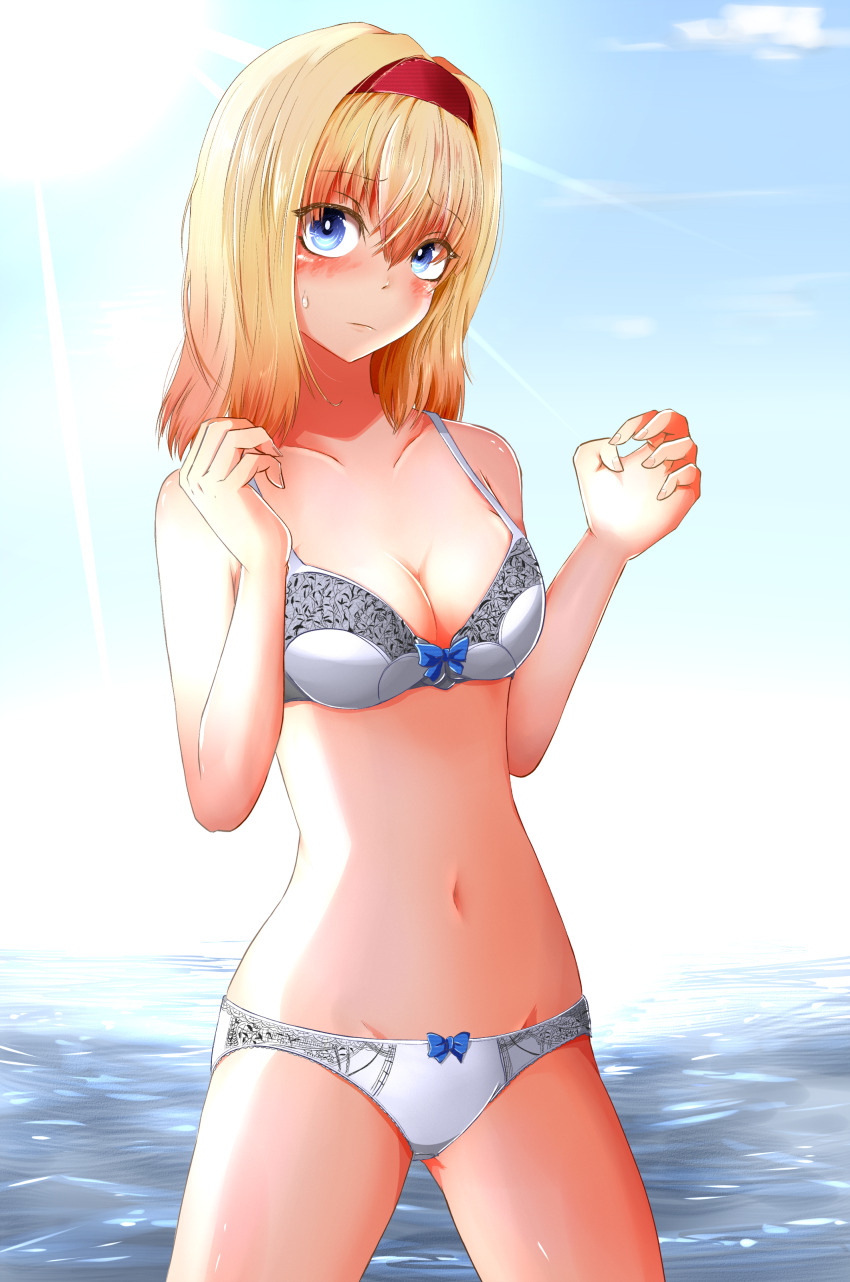 1girl absurdres alice_margatroid bikini blonde_hair blue_eyes blue_sky blush bow bow_bikini breasts cleavage closed_mouth cloud commentary_request cookie_(touhou) cowboy_shot day hairband highres hinase_(cookie) lace_bikini looking_at_viewer medium_breasts navel ocean outdoors red_hairband sakuna_brownie sky solo sun swimsuit touhou white_bikini
