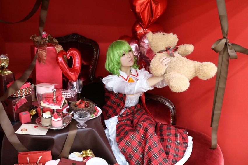 1girl ascot bag balloon black_eyes blackberry_(fruit) bowl box brown_ribbon cake chair cherry commentary_request cosplay cosplay_photo female_focus food frilled_ascot frilled_shirt_collar frills fruit glass_bowl green_hair heart heart_balloon holding holding_stuffed_toy kazami_yuuka kazami_yuuka_(cosplay) letter long_sleeves petticoat photo_(medium) plaid_clothes plaid_skirt plaid_vest red_skirt red_vest ribbon shirt short_hair sitting skirt skirt_set solo strawberry stuffed_animal stuffed_toy table teddy_bear touhou vest white_shirt yellow_ascot
