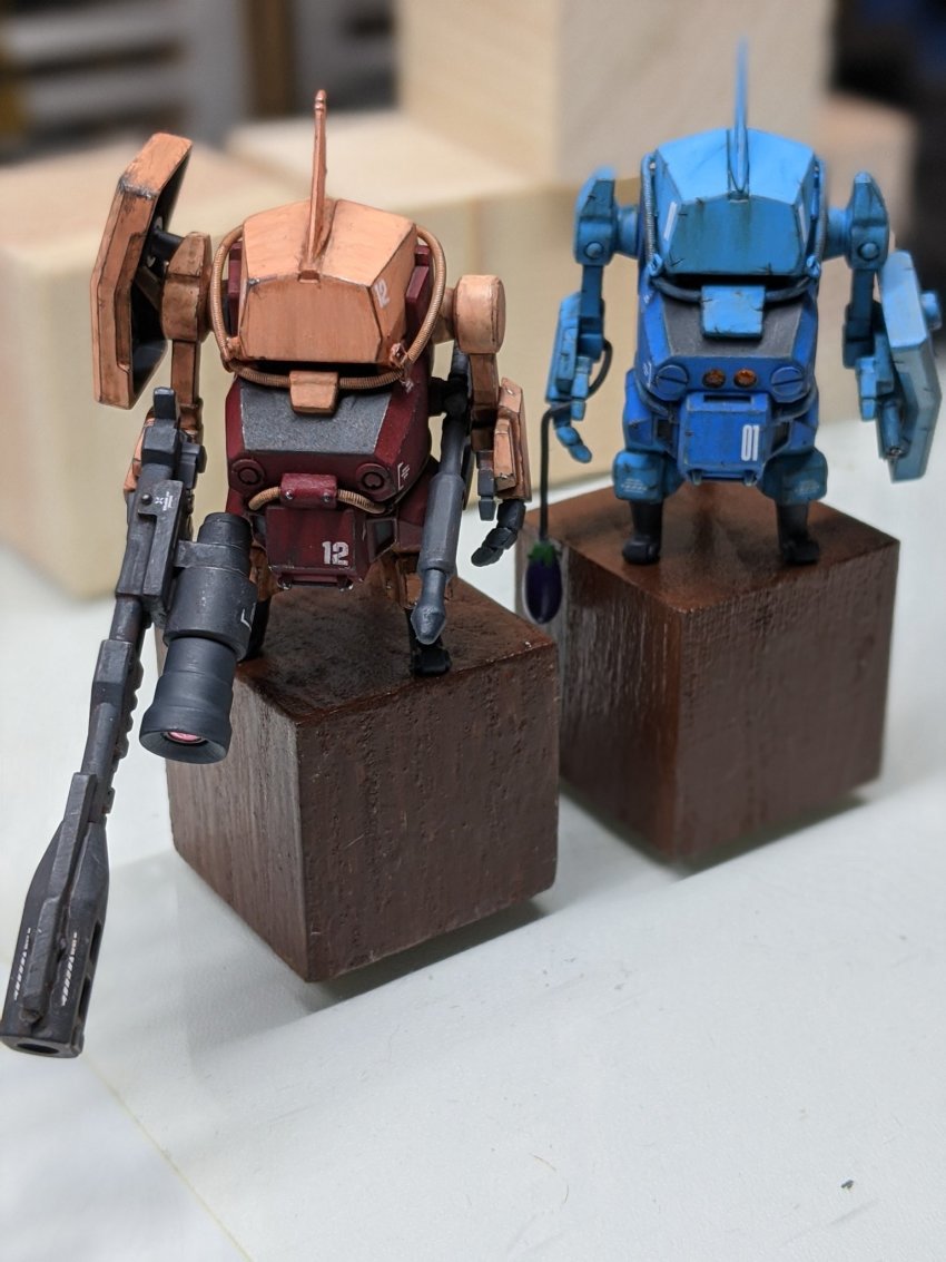 cavico_models fusion gouf_custom gun gundam gundam_08th_ms_team highres holding holding_gun holding_weapon holding_whip jgsdf_type_07_tank_nacchin matage_sanjuro mecha mobile_suit_gundam model_kit model_kit_(medium) no_humans open_hand photo_(medium) robot shield standing unconventional_media weapon zaku_ii_s_char_custom
