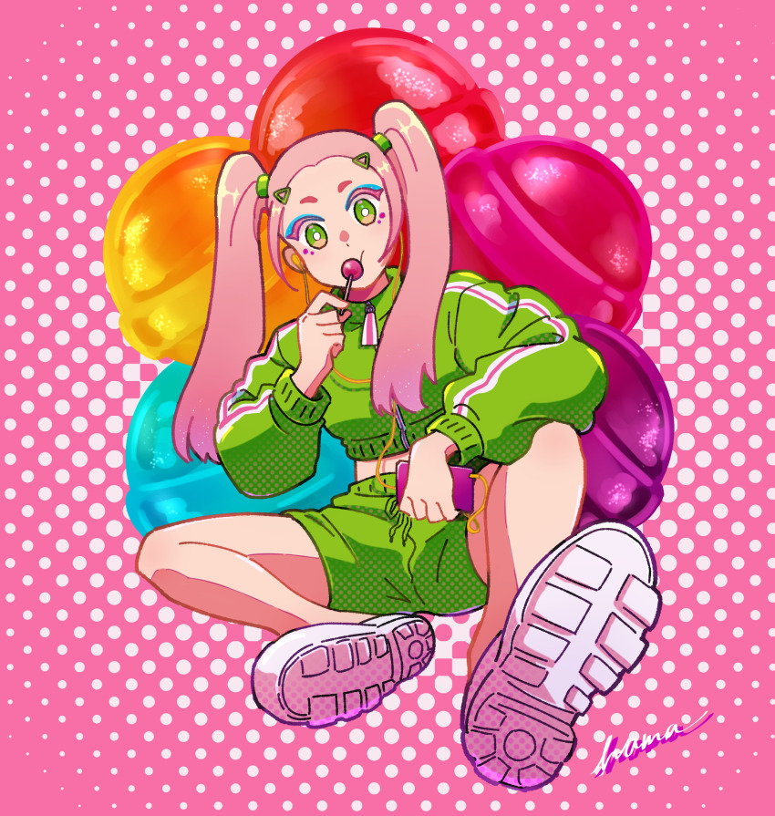 1girl blue_eyeshadow candy cellphone earphones eyeshadow food full_body green_eyes green_jacket green_shorts hair_ornament hairclip hama_takenaka highres holding holding_candy holding_food holding_lollipop holding_phone jacket lollipop long_hair looking_at_viewer makeup midriff_peek original phone pink_background pink_eyebrows pink_hair polka_dot polka_dot_background shoes short_shorts shorts signature sitting smartphone solo track_jacket twintails white_shoes