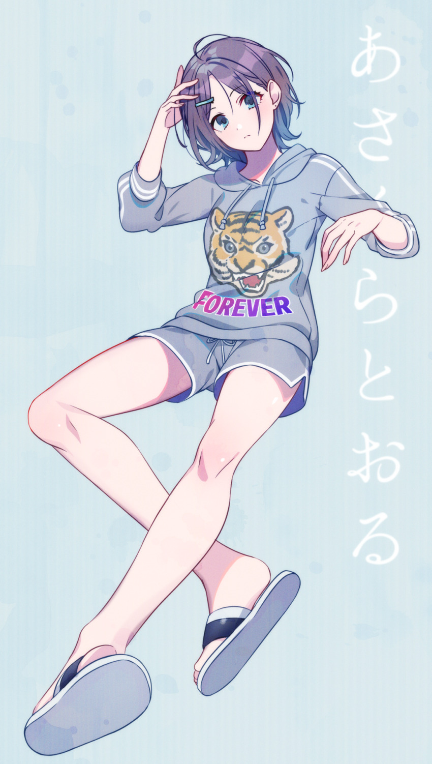1girl asakura_toru bare_legs blue_background blue_eyes breasts character_name commentary dolphin_shorts english_text feet full_body grey_hoodie grey_shorts hair_ornament hairclip hand_up highres hood hood_down hoodie idolmaster idolmaster_shiny_colors legs long_sleeves looking_at_viewer medium_breasts medium_hair parted_bangs sandals shadow short_shorts shorts solo thighs toes translated yuura