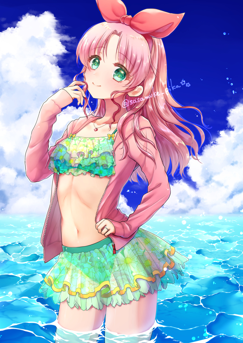1girl artist_name bikini bow cloud day frilled_bikini frills green_eyes hair_bow hand_up highres jacket jewelry laura_newfield necklace outdoors parted_bangs pink_jacket red_bow sasamuke_pika smile swimsuit wading water yuukyuu_gensoukyoku