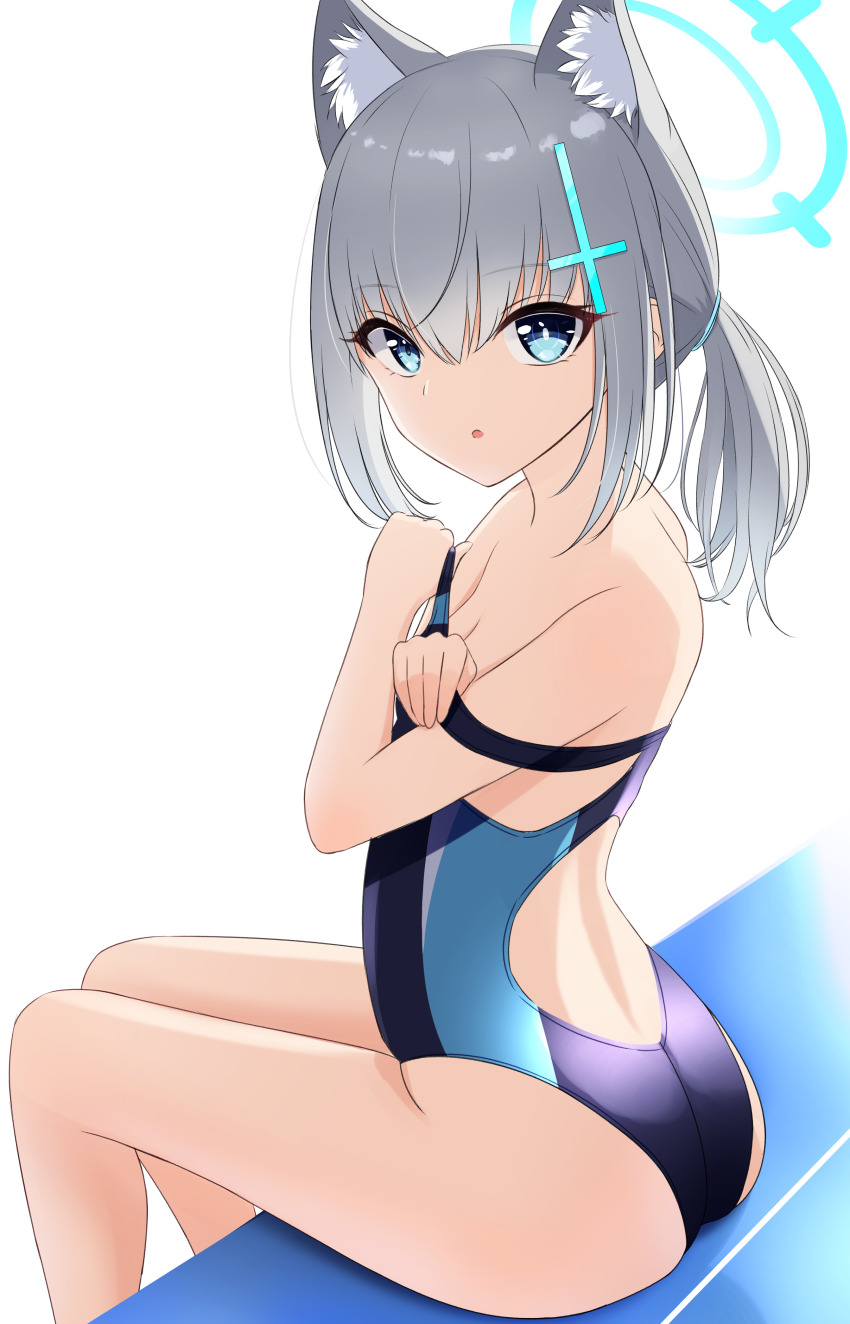 1girl absurdres animal_ear_fluff animal_ears black_one-piece_swimsuit blue_archive blue_eyes breasts competition_swimsuit cowboy_shot cross_hair_ornament extra_ears from_behind grey_hair hair_ornament halo highres low_ponytail medium_breasts medium_hair mismatched_pupils multicolored_swimsuit nokonoko one-piece_swimsuit ponytail shiroko_(blue_archive) shiroko_(swimsuit)_(blue_archive) simple_background solo swimsuit white_background