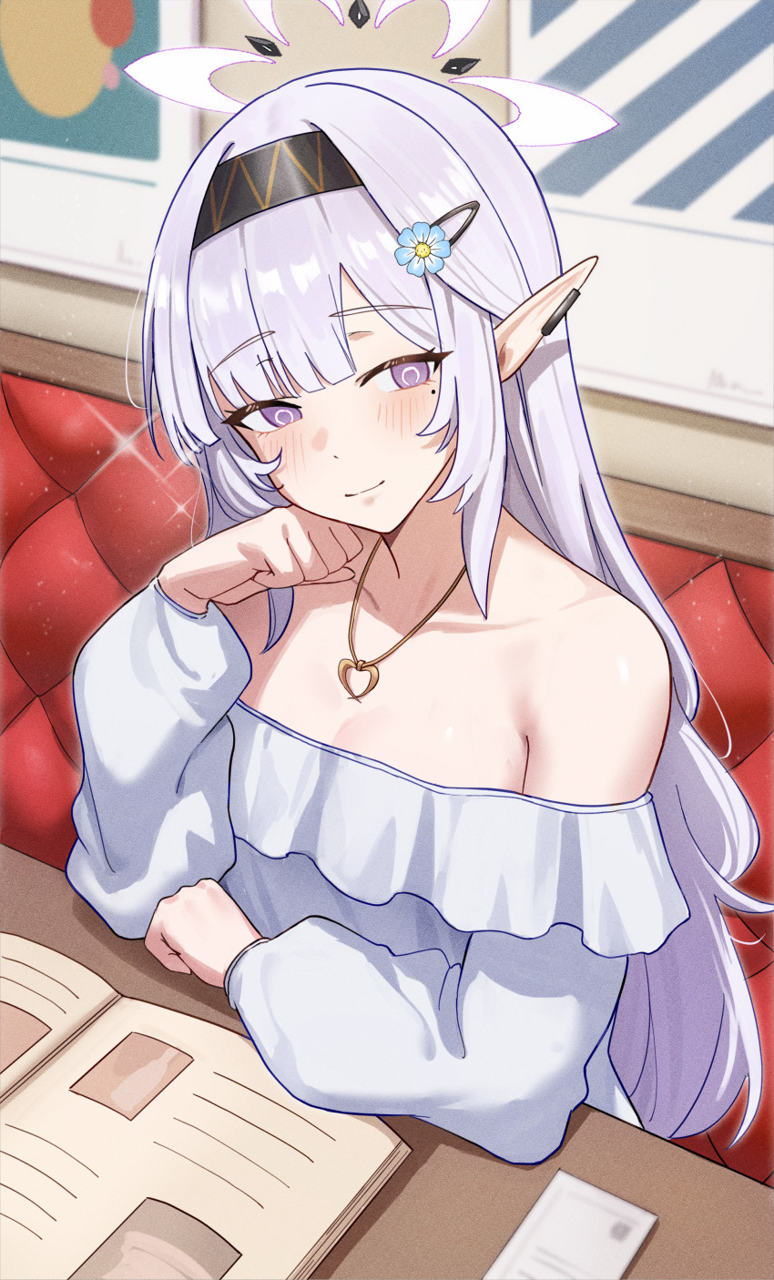 1girl absurdres alternate_costume bare_shoulders black_hairband blue_archive book boyin casual closed_mouth collarbone commentary commentary_request ear_bar frilled_shirt frills gold_necklace hair_ornament hairband hairclip halo head_rest heart heart_necklace highres himari_(blue_archive) jewelry long_hair long_sleeves looking_at_viewer mole mole_under_eye necklace off-shoulder_shirt off_shoulder open_book parted_bangs pointy_ears puffy_long_sleeves puffy_sleeves purple_eyes shirt smile solo sparkle sparkling_aura upper_body white_hair white_halo white_shirt